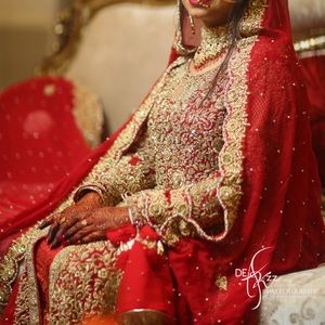Red and gold Wedding lacha/maxi dress, open in the front with a banarsi lining.